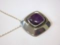 Erik Granit: Rintakoru / Riipus vuodelta 1964. Hopea ja Ametiisti. Ketju. / Erik Granit, Finland: Combined Brooch / Pendant from 1964. 813 Silver with Amethyst. With chain.  - Nro 4319